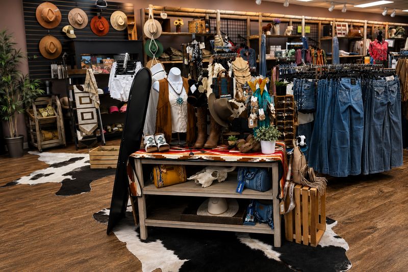 Interior of a store with clothing and accessories on display